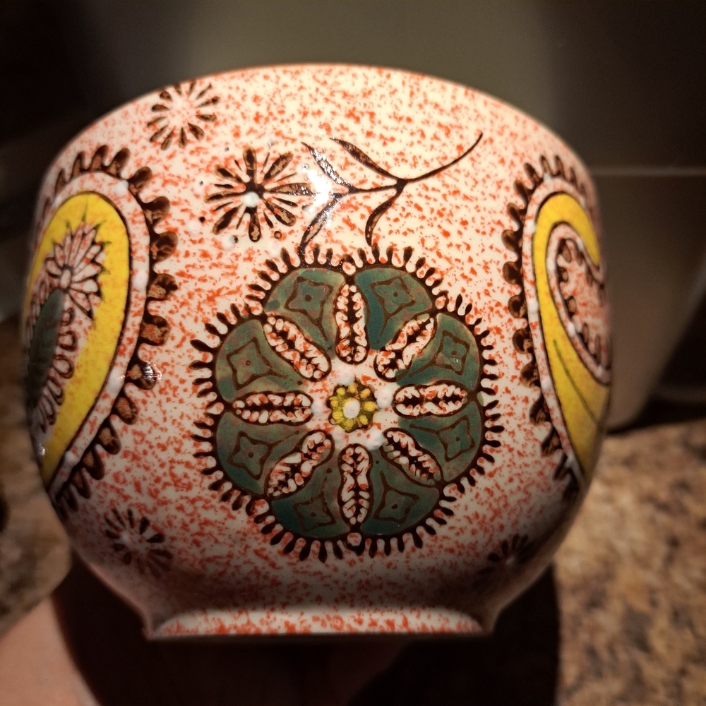 Floral Patterned Ceramic Mug holds about a 16.9 oz bottle and a half of liquid